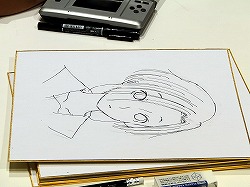 画像集#010のサムネイル/［TGS 2009］“自分の彼女”の似顔絵をミノ☆タロー氏に書いてもらえる抽選イベントも。「ラブプラス」の「デキシーズ 幕張出張所」レポート