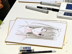 画像集#015のサムネイル/［TGS 2009］“自分の彼女”の似顔絵をミノ☆タロー氏に書いてもらえる抽選イベントも。「ラブプラス」の「デキシーズ 幕張出張所」レポート