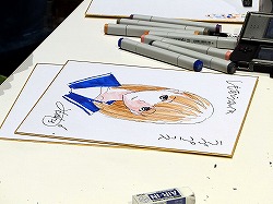 画像集#016のサムネイル/［TGS 2009］“自分の彼女”の似顔絵をミノ☆タロー氏に書いてもらえる抽選イベントも。「ラブプラス」の「デキシーズ 幕張出張所」レポート