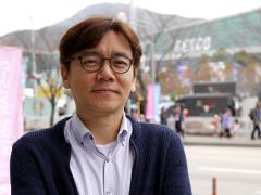 MMORPG「創世記戦: アンタリアの戦争」では株式などのシミュレーション要素を導入。開発チームを率いるキム・テゴン氏へのインタビューを掲載